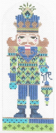 Kelly Clark Christmas needlepoint canvas of a nutcracker with peacock feathers