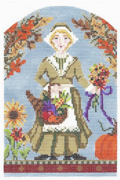 Kelly Clark Thanksgiving needlepoint canvas of a female pilgrim holding a cornucopia and flowers with fall foliage