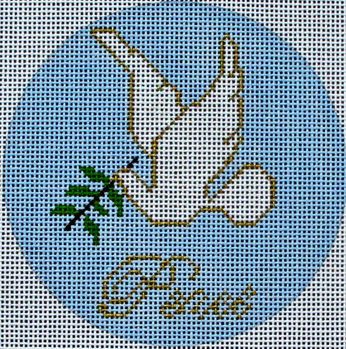 DC designs round needlepoint canvas of a dove holding an olive branch with the word "peace" in gold