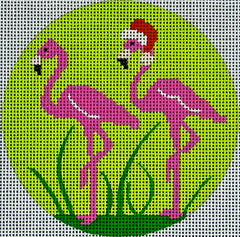 DC designs round Christmas ornament needlepoint canvas of two flamingos with a Santa hat on a tropical green background