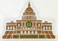 Kate Dickerson Christmas needlepoint canvas of the US Capital building in Washington D.C. made out of gingerbread with a Christmas wreath and garland decorating it